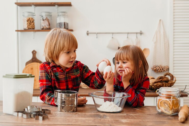 Free Photo kids cooking together at home