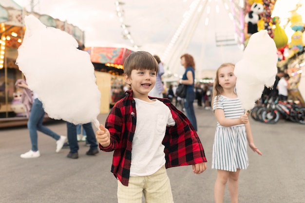 Kids enjoying cotton candy