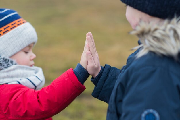 Kids giving high five