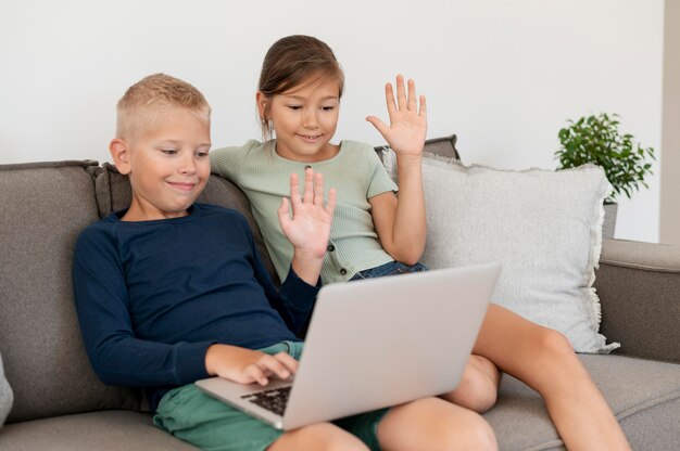 Kids having a family videocall