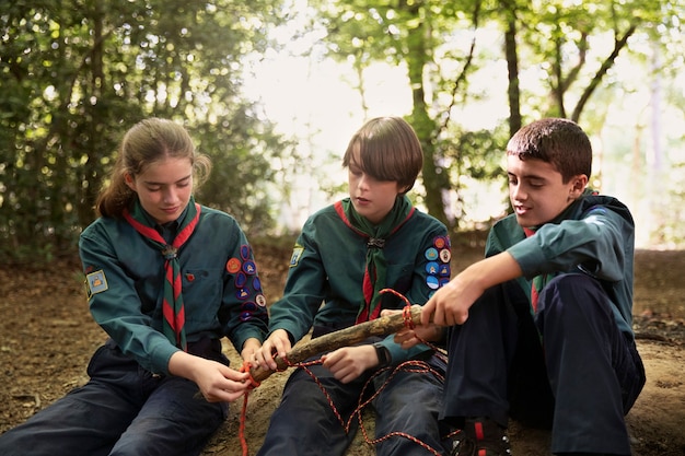 Kids having fun as boy scouts