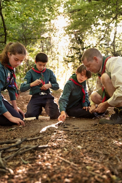 Kids having fun as boy scouts