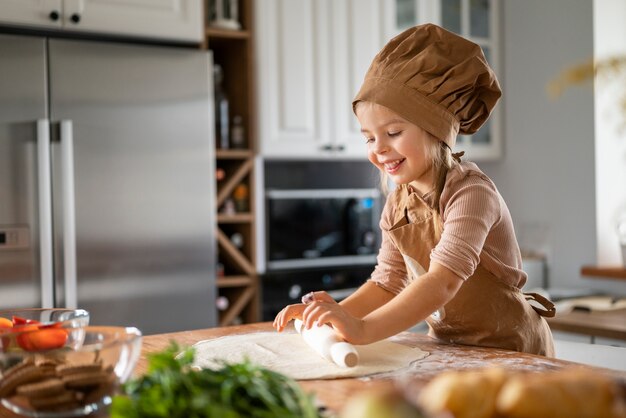 Kids having fun cooking at home