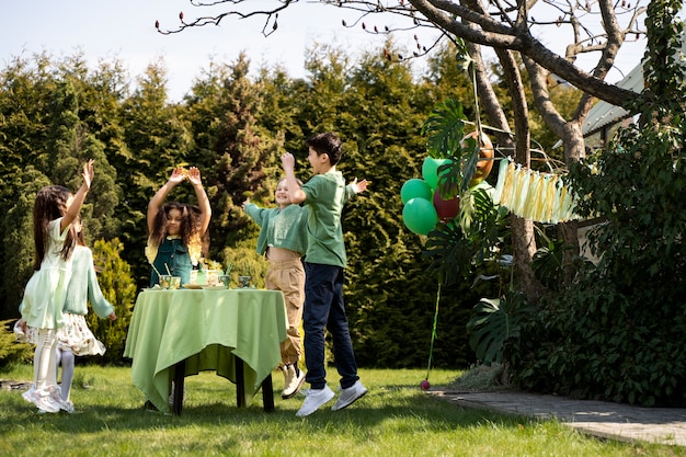 Free photo kids having fun at jungle themed party