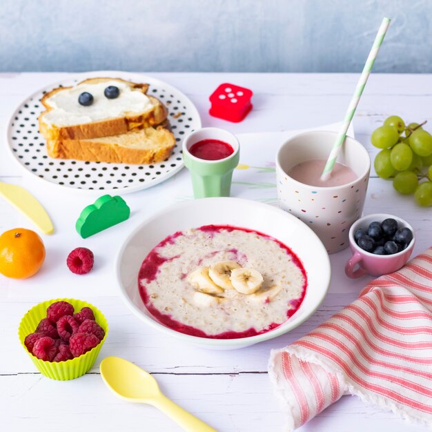 Kids healthy porridge breakfast with sandwich