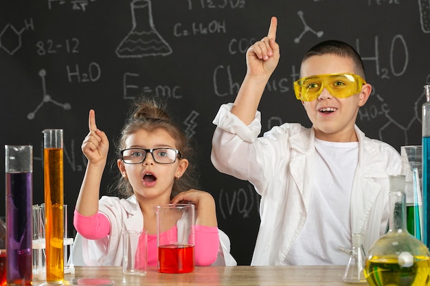 Kids in laboratory doing experiments