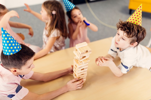 Free photo kids playing on birthday party