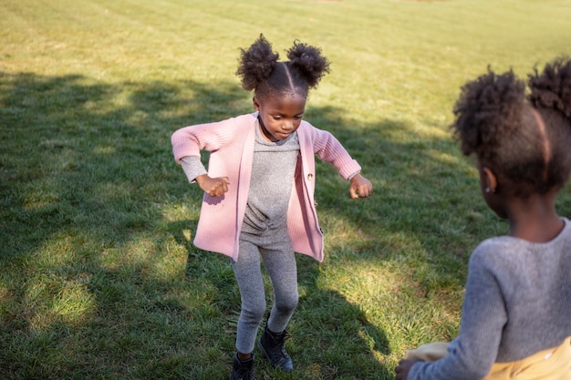 Free photo kids playing outdoors