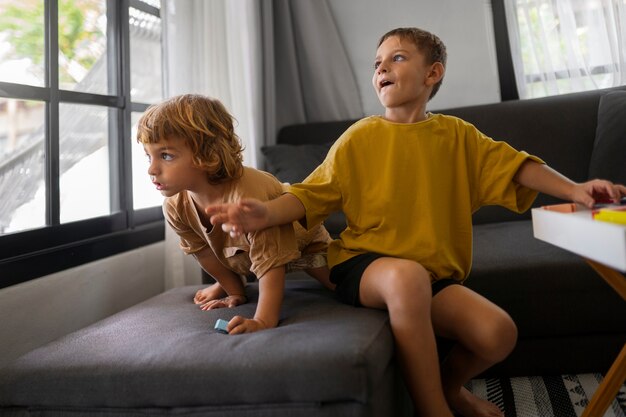 Kids playing together full shot