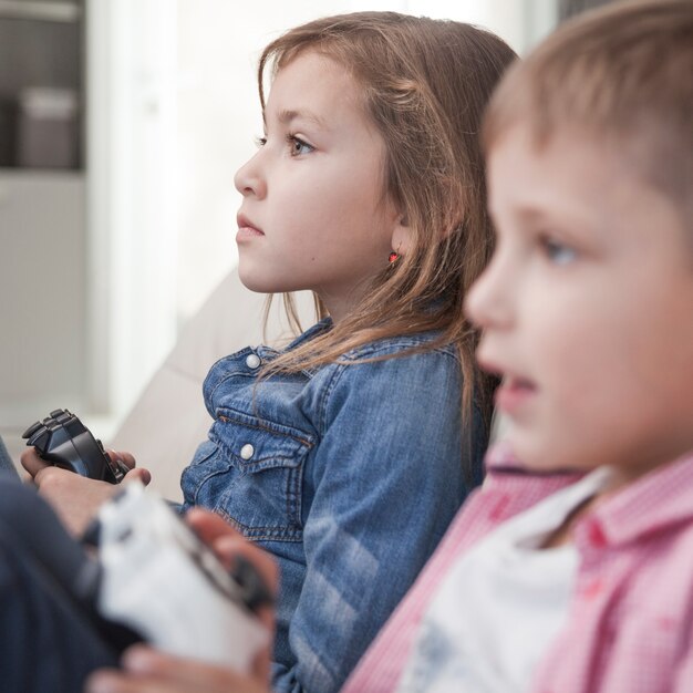 Kids playing video games