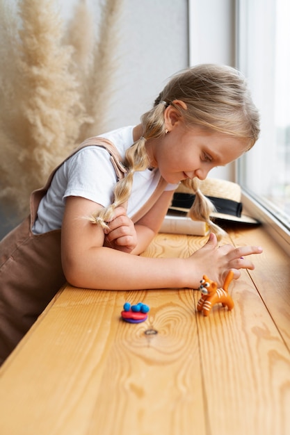 Kids playing with play dough