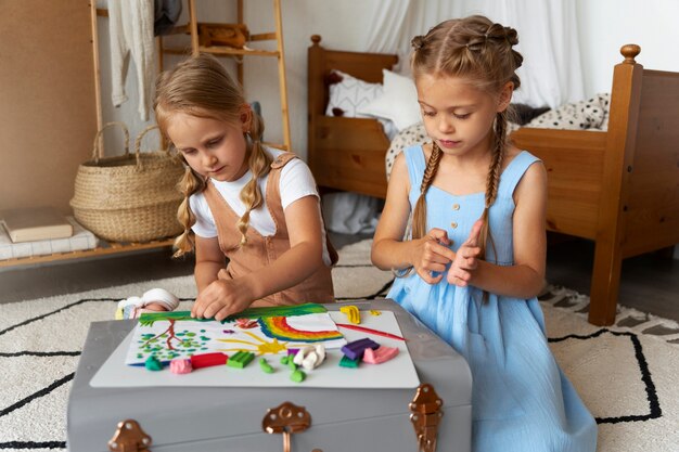 Kids playing with play dough