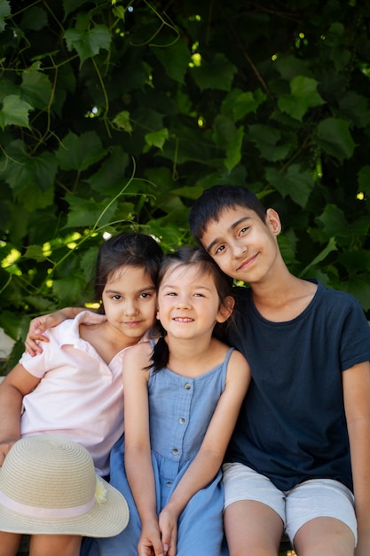 Free photo kids spending time outdoors in a rural area enjoying childhood