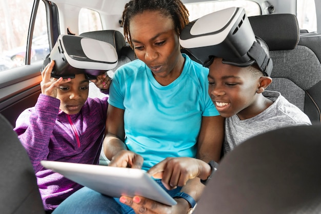 Free photo kids wearing virtual reality goggles