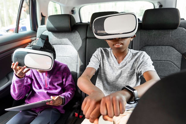 Kids wearing virtual reality goggles