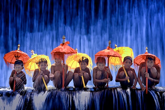 Kids with coloured umbrellas