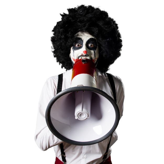 Killer clown holding vintage clock