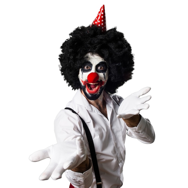 Killer clown presenting something