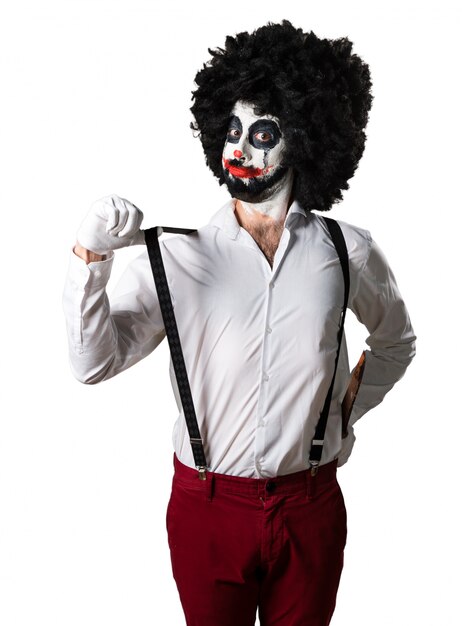 Killer clown with knife proud of himself