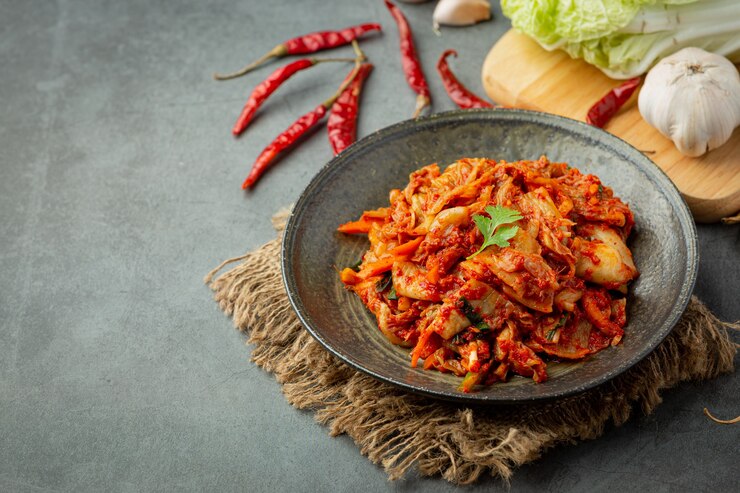 Free Photo kimchi ready to eat in black plate