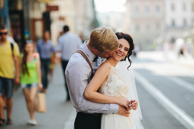 Kiss on the shoulder from behind