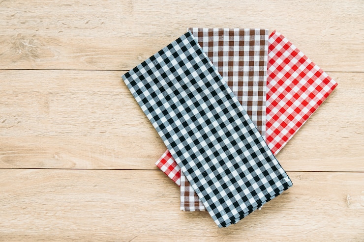 Free Photo kitchen cloth on wood table