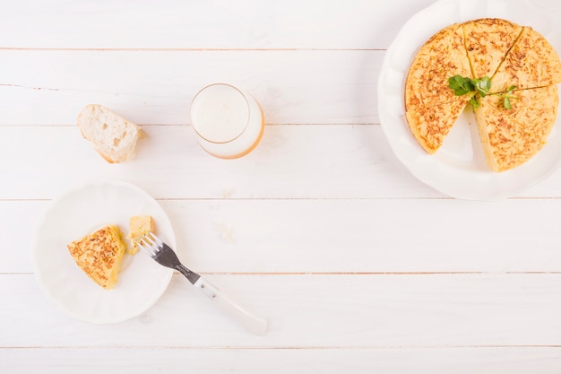 Kitchen desktop with pie and drink