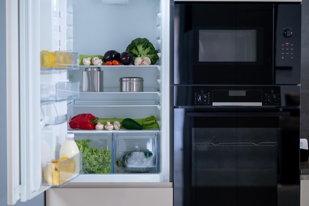 Kitchen facilities. Picture of the fridge with food inside