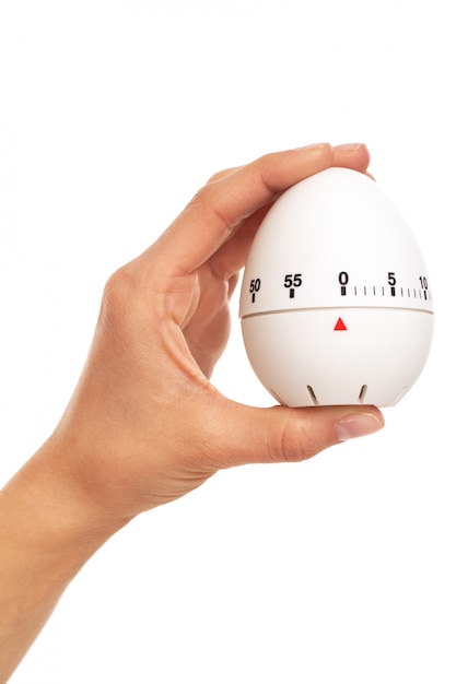 Kitchen timer in woman's hand