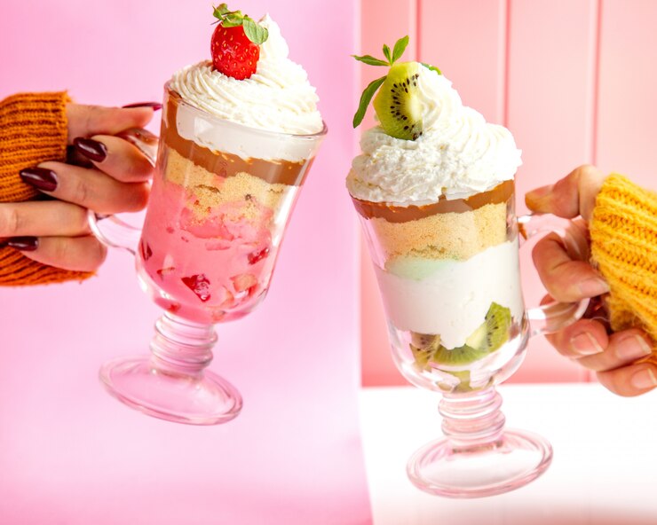 Free Photo kiwi and strawberry parfait crumbled cookies whipped cream caramel strawberry and kiwi