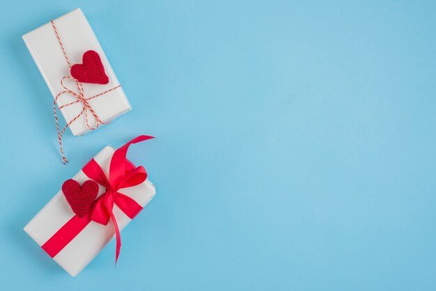 Knitted hearts on cute gift boxes