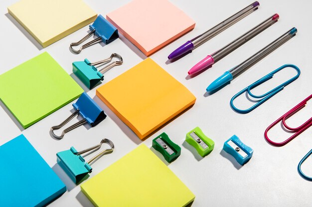 Knolling concept with sticky notes and accessories high view