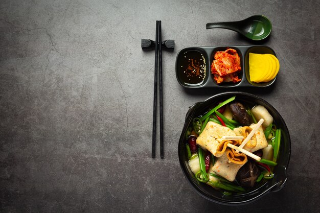 Korean fish cake and vegetable soup on table