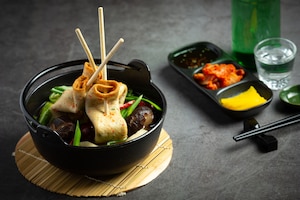 Korean fish cake and vegetable soup on table