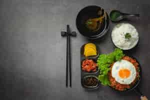 Free photo korean food. fried rice with kimchi serve with fried egg