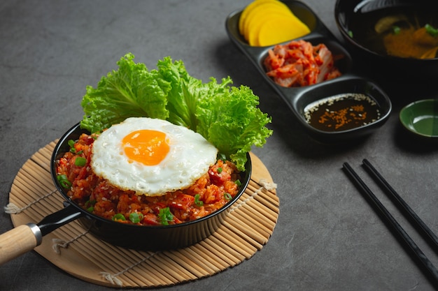 Korean food. fried rice with kimchi serve with fried egg