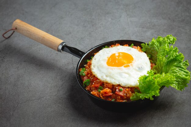 Korean food. fried rice with kimchi serve with fried egg