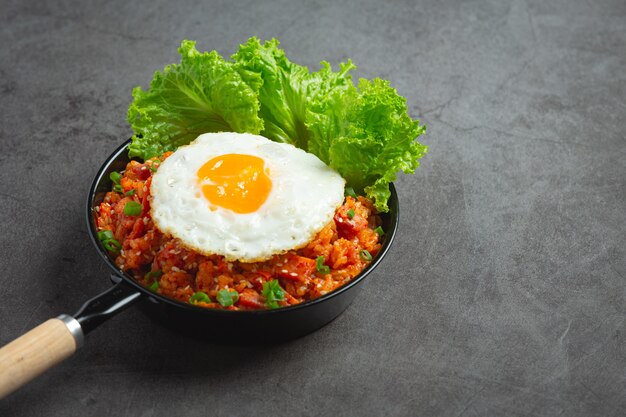 Korean food. fried rice with kimchi serve with fried egg