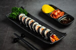 Korean food, kim bap - steamed rice with vegetables in seaweed.