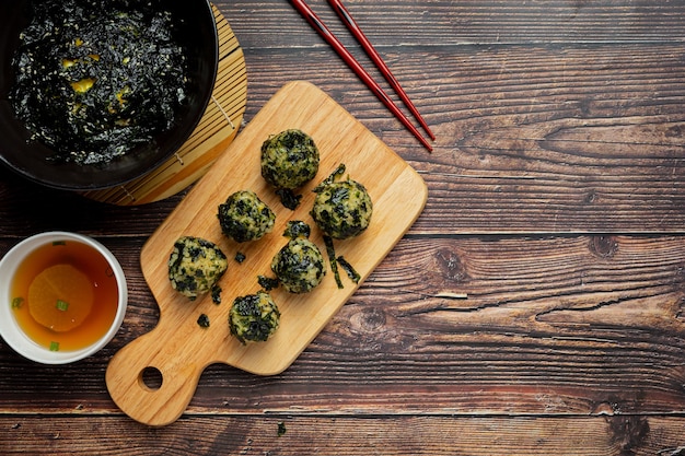 Free photo korean rice ball on marble background