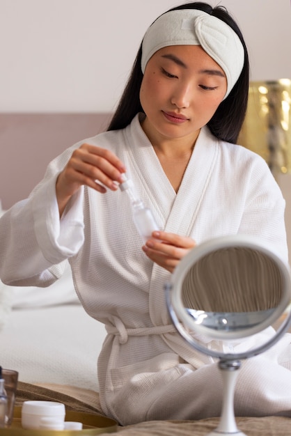 Korean woman doing skincare