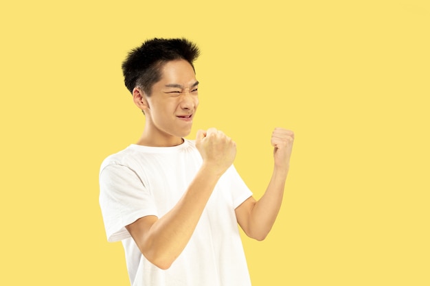 Korean young man's half-length portrait on yellow