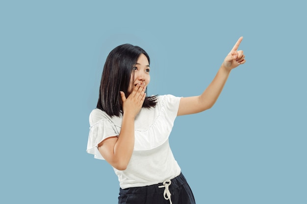 Korean young woman's half-length portrait on blue