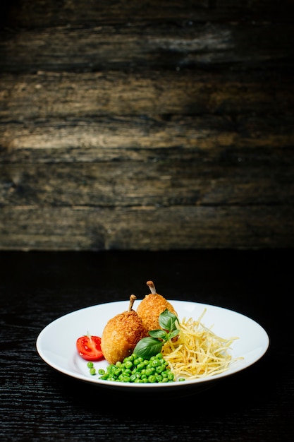 Kyev cutlets with bone inside and green beans