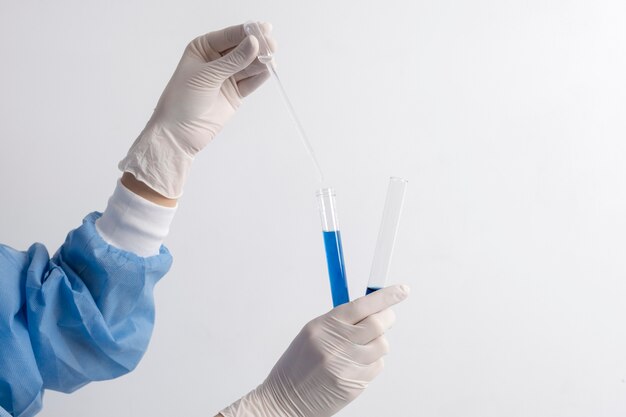 Lab doctor performing medical exam of urine