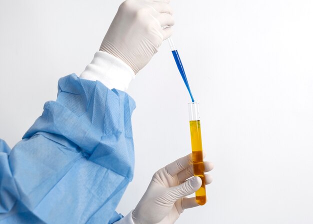 Lab doctor performing medical exam of urine