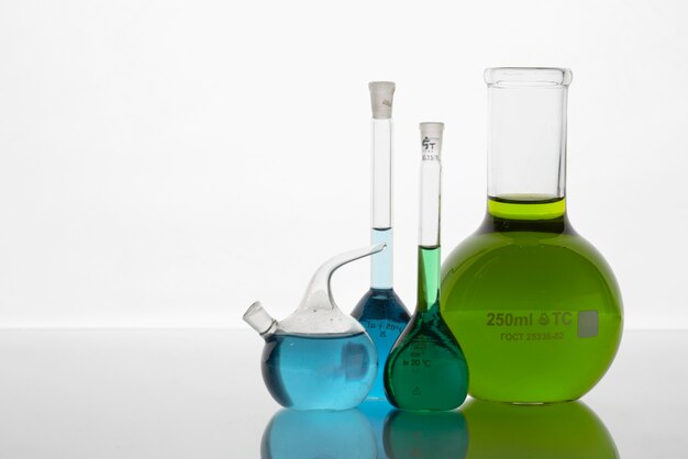 Lab glassware assortment with colorful liquids