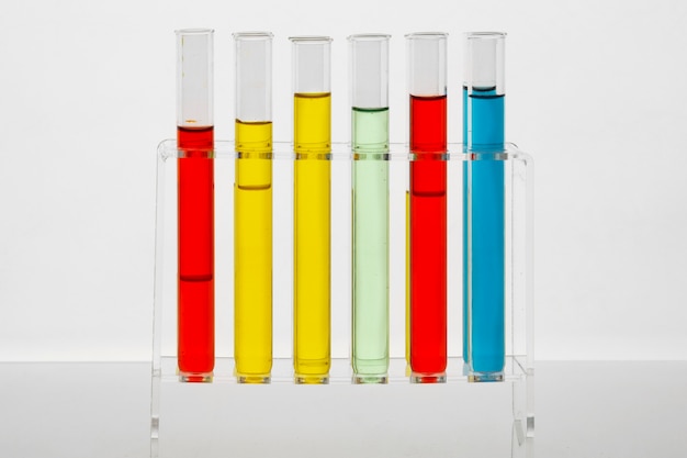 Lab glassware with colored substances still life