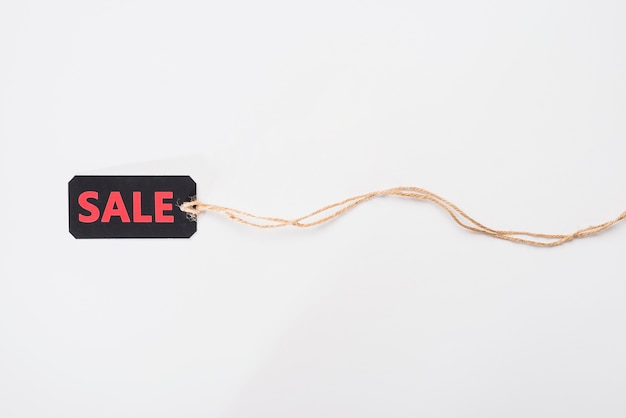 Label with sale inscription and cord 