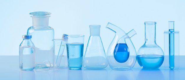 Laboratory glassware and blue background